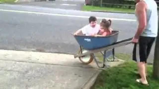 Ryan/Ryleigh in wheel barrow