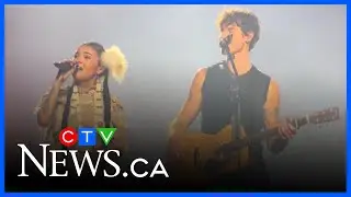 Shawn Mendes performs with Alberta Cree singer Tia Wood