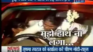 Drunk woman locks herself inside car after being stopped for drunk driving test