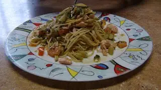 Spaghetti with salmon and asparagus in a white wine sauce