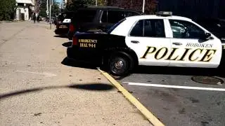 Out Of State Buffing: Walking By Hoboken One Police Plaza In Hoboken, New Jersey
