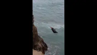 This guy's job is to jump from cliff and get money from tourists.