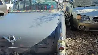 Flood Penetrol.  Rolled on primer, grey white , and black.  put in some ghost blue flake, shown @end