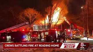 2 evaluated as crews battle massive fire at Mass. home