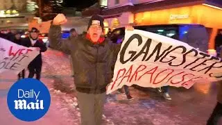 Anti-Trump protesters break through Davos security cordon - Daily Mail