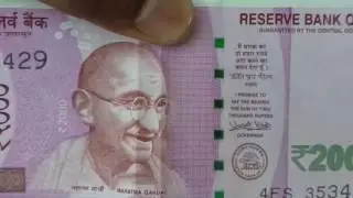 Gandhiji Smiles on 2000 RS Note