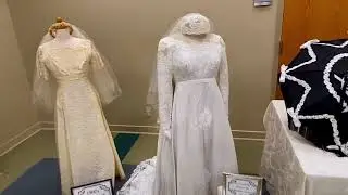 A walk through the &ldquo;Decades of Dresses&rdquo; exhibit at the Ascension Parish Library.
