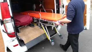 Private Ambulance / hearse  stretcher / trolley -- one man loading operation