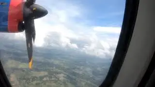 US Bangla flight from Rajshahi to Dhaka in a Cloudy Sky