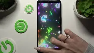 Download Magic Fluid Live Wallpaper on your TCL 40R and set it as your background.