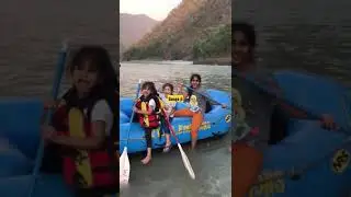start kids doing river rafting