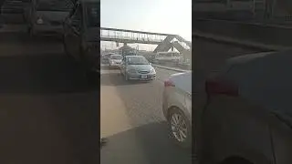 DANGEROUSLY CROSSING BUSY ROAD KETU LAGOS