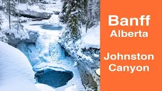 Hiking in winter, Banff national park solo, in Johntson canyon. Alberta, Canada.