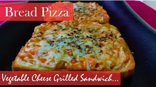 Open faced vegetable cheese grilled sandwich / bread pizza