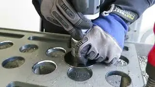 Rounding radius 4 mm edges on holes in a steel plate with Bevel Mite&reg; EBI 06 Premium