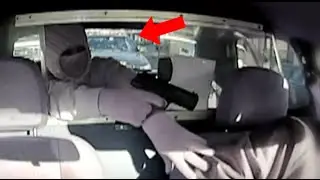 Robber Attempts To Rob Taxi Driver Oblivious To Cop