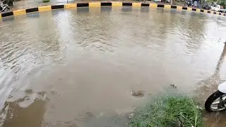Drain Rain Water Flooding Road After Heavy Rainstorm