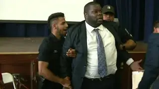 Detroit police commissioner removed from meeting in handcuffs, arrested