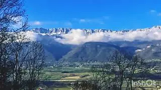 Alpine mountains in the clouds