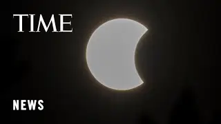 Skygazers Gather To Witness Rare HybridSolar Eclipse
