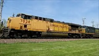 UP 7028 a C6044AC with CSX power lead a ethanol train west in Geneva IL