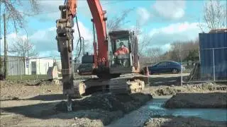 Excavator and rockhammer