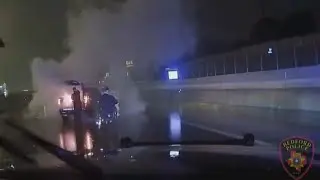 Fellow officer pulls trapped officer to safety after fiery crash; Body cam, dash cam video released