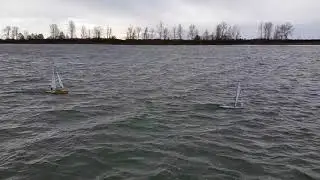 DFlt95 Chasing IOM with B rig, 20 knt winds