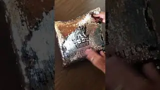 Foxyware Reverse Sequin Pillow with a logo