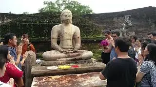At Polonnaruwa Watadagabe site. Japanese tourists.