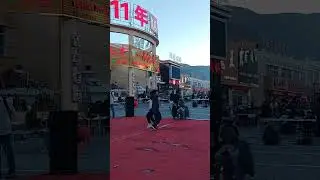 Tashkurgan at night. Xinjiang. China. Including free theatre performance and dance at square