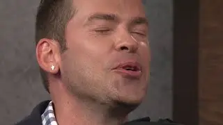 Derrick Shore gets kissing quiz from Dr. Viviana Coles for National Kissing Day