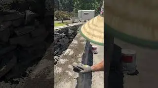 Brushing Away Excess Mortar Reveals Stone Patterns #stonework #landscaping #canberra