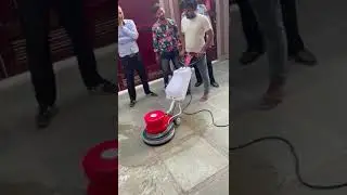FLOOR SCRUBBING MACHINE