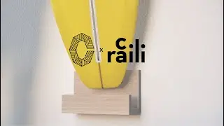 Loading a Surfboard on a Crawford x Raili CA Design Surfboard Wall Rack