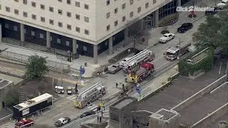 Vehicle catches fire in downtown Houston parking garage