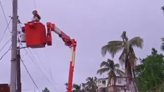 JPS workers off the main to the lane fixing the electric lines