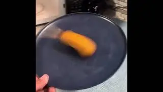 Man Eats Spinning Corndog