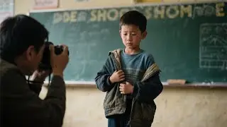 School Photographer Grows Concerned When 9 Year Old Boy Refuses to Take Off His Jacket for Pictu