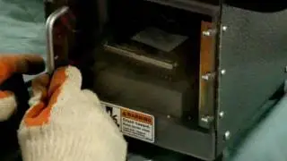 Hard disk crusher in action