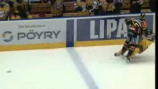 Simon Bertilsson hits Jonas Berglund