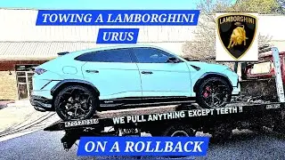 Towing A 2023 Lamborghini Urus On A Rollback Flatbed Towtruck Wrecker Fail Tow Bolt Location Repo.
