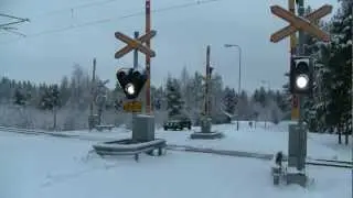Finnish Freight Train 5404 passes korkalonkangas level crossing