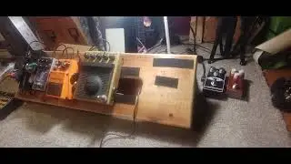 Homemade guitar pedal board made of scrap wood
