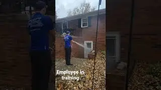 Pressure wash employee in training