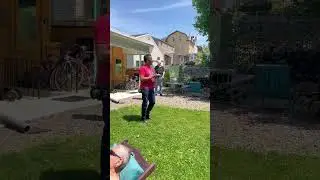 Behind The Scenes: Photographer  Sets Up Drone Shot While Crew Members Place Models in Position.