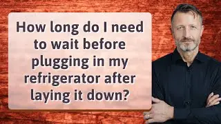 How long do I need to wait before plugging in my refrigerator after laying it down?