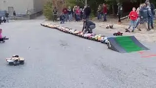 Rc motorcycle jumps 53 rc cars while doing a backflip.