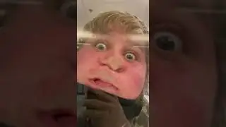 Man presses face up against glass. GONE WRONG
