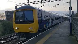 Refurbished Class 323 departs East Didsbury